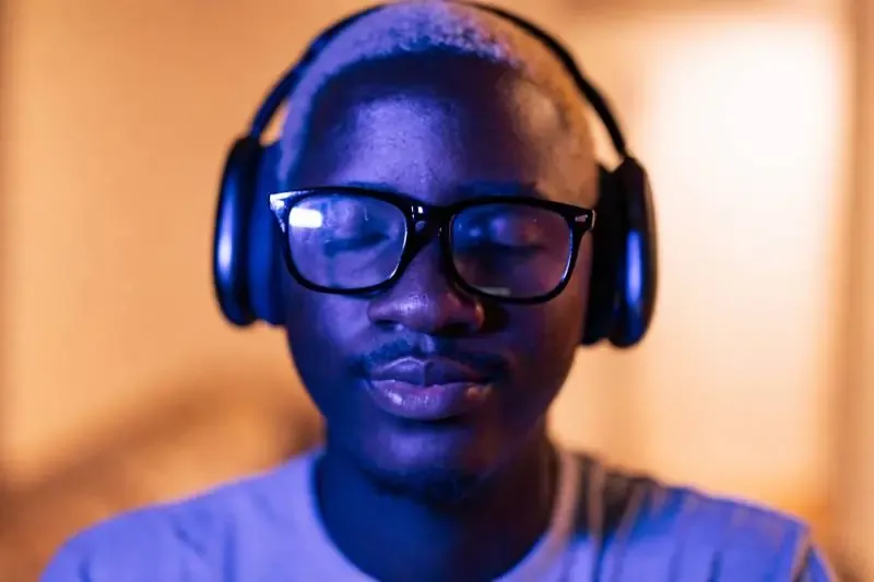 Digital mixing console with multiple channel faders prepared for live audio mixing